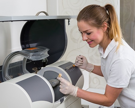 Woman using CEREC system