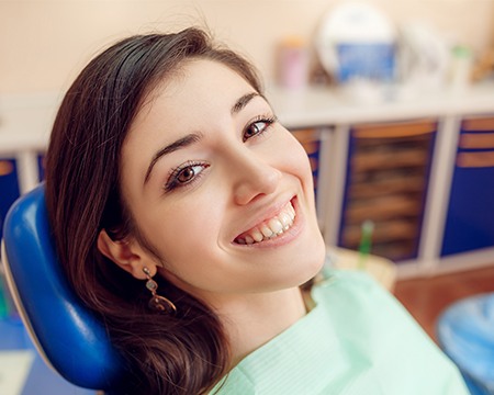 Smiling woman in dental chair