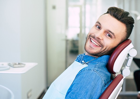 Patient in Hammonton smiling with dental implants