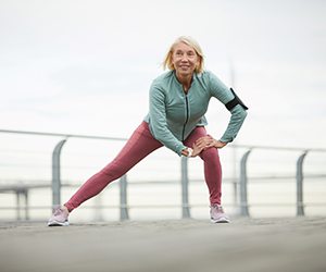 Patient in Hammonton exercising with dental implants