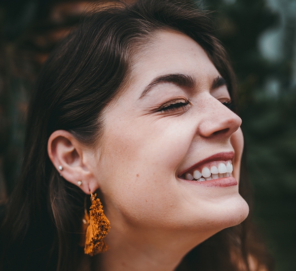 Woman with beautiful smile outdoors