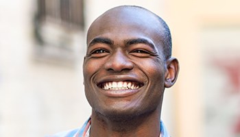 Smiling young man outdoors