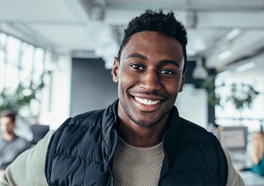 Young man with bright smile