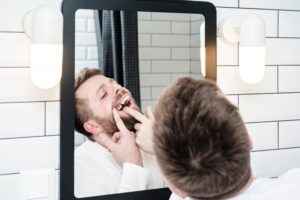 man with missing tooth