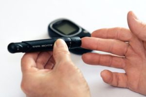 Testing blood sugar on finger